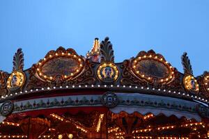 The Enchanting Carousel at Dusk A Dreamy Escape into a World of Whimsy and Delight photo