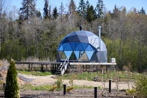 A Modern Geodesic Dome beautifully integrated in a peaceful Natural Setting for visitors to enjoy photo
