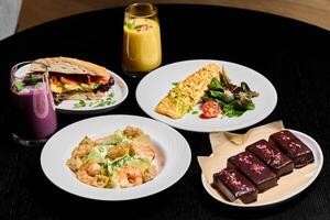 Indulge in a Variety of Delicious Assorted Dishes and Beverages Perfect for Food Lovers Everywhere photo