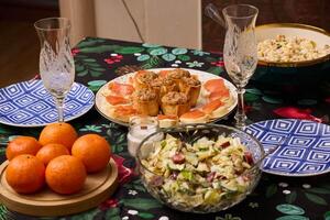 A Festive Table Setting with Delicious Food and Refreshing Drinks for Your Enjoyment photo