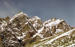 Mount Sayan in winter in snow. The nature of the mountains is sayan. photo