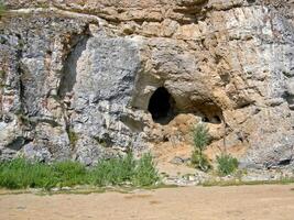 Caves in the rocks on the Beloretsky tract. photo