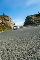 Asphalt road to the mountains. Mountain track on Altai. photo