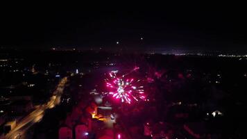 Fireworks are lit up in the sky over a city video