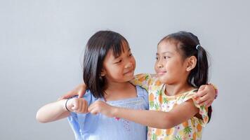 Fist Bump Friends Deal Partner Touch Pair Hands. Elementary students greet each other Trust in Team Giving Fist Bump to Greeting Say Hello or Say goodbye on weekends. photo