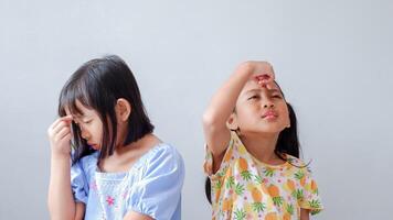 worry about something, small kid feel sick and tired, concerned about family problems or problems at school. photo