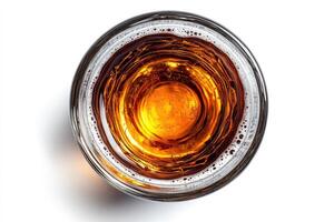 Glass of beer seen from above on white background photo
