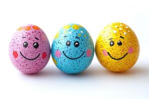 Three colorful easter eggs showing happiness and joy photo