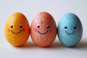 Three colorful easter eggs showing happiness and joy photo