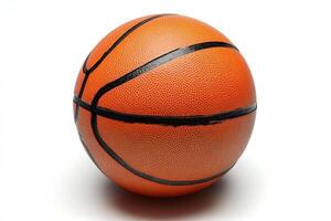 Basketball ball resting on white background representing sporting activity photo