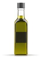Clear glass bottle filled with olive oil standing against a plain background photo