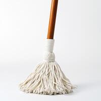 Cleaning equipment with a cotton mop head on a light background suitable for various cleaning tasks photo