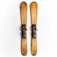 Classic wooden skis with bindings ready for winter trails and snowy adventures in the mountains photo
