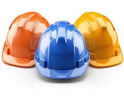 Colorful construction helmets arranged in a triangle on a white background for safety awareness and workplace guidelines photo