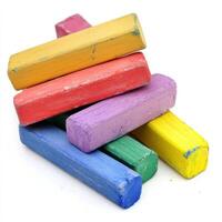 Colorful chalk pieces stacked together create a vibrant display of art supplies suitable for various creative projects photo