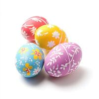 Colorful Easter eggs decorated with floral patterns arranged on a light background for spring celebrations and festivities photo