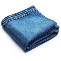 Denim fabric folded neatly on a white surface showcasing its texture and color variations photo