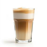 Delicious layered latte served in a clear glass, showcasing rich coffee and frothy milk in a cozy cafe setting photo
