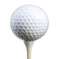Golf ball balanced on a wooden tee ready to be struck on the green at a golf course just before a tournament photo