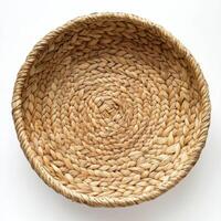 Handwoven natural fibers basket showcasing intricate weaving patterns and a warm earthy tone for home decor or storage photo