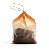 Unique tea bag filled with loose leaf tea showcased against a plain background photo