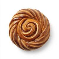 Swirled pastry with golden-brown sheen on a plain background showcasing intricate details and texture of the baked item photo