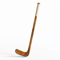 Vintage wooden hockey stick stands upright on a clean surface highlighting its craftsmanship and unique design photo
