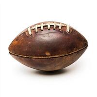 Vintage leather football resting on a white surface, showcasing its aged texture and craftsmanship photo