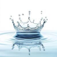 Water splash creating a crown shape in calm water during daylight photo
