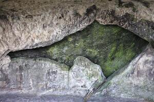 Broken wall in a cave with interesting shape photo