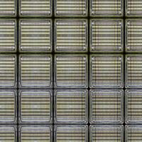Seamlessly tileable patterned grid of glass bricks creates a uniform design with reflective surfaces photo
