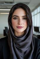 Portrait of a young businesswoman wearing a hijab photo