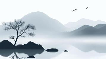 Silhouette of a mountain landscape with a tree and birds photo