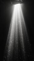 Light rays penetrate darkness creating a serene atmosphere underwater photo