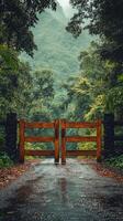Beautiful forest entrance with a wooden gate and vibrant autumn foliage in the background photo