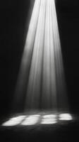 Light rays penetrate darkness creating a serene atmosphere underwater photo