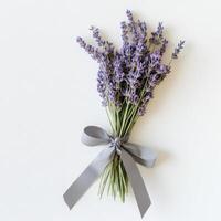 Beautiful lavender bouquet tied with gray ribbon on a white background photo
