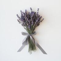 Beautiful lavender bouquet tied with gray ribbon on a white background photo