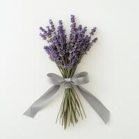 Beautiful lavender bouquet tied with gray ribbon on a white background photo