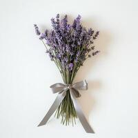 Beautiful lavender bouquet tied with gray ribbon on a white background photo