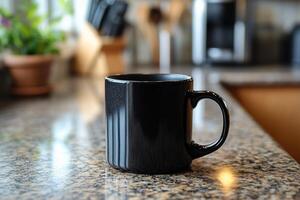 Black ceramic coffee mug on a kitchen countertop with plants in the background photo
