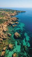 Breathtaking coastal view of turquoise waters and rocky cliffs under a clear sky in Cyprus photo