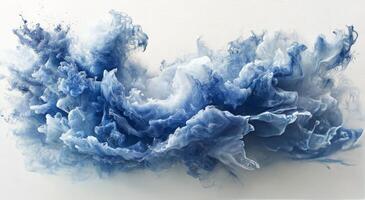 Blue ink swirling in water creating abstract shapes and patterns photo