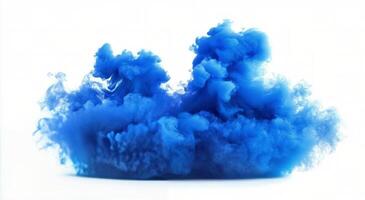 Blue ink swirling in water creating abstract shapes and patterns photo