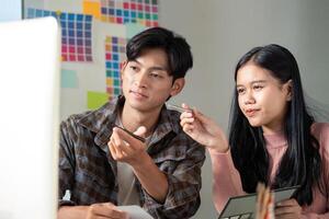 Creative team graphics design collaboration in modern workspace engaging visual content development photo