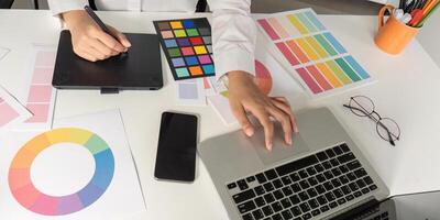 Creative design process in graphic design workspace office environment digital art creation productive viewpoint collaboration concept photo
