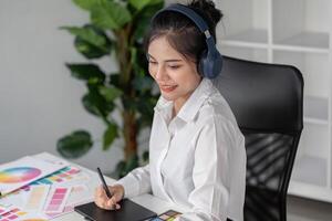 Creative graphics design session home office digital art creation cozy workspace engaged professional idea development photo