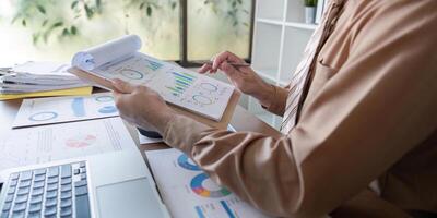 Data analysis and reporting in a business setting office space infographic materials modern environment close up view professional insights photo