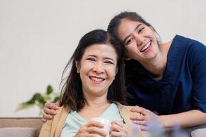 Joyful moment between mother and daughter home setting family interaction indoor environment warm atmosphere connection photo