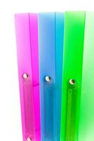 three multicolored folders photo